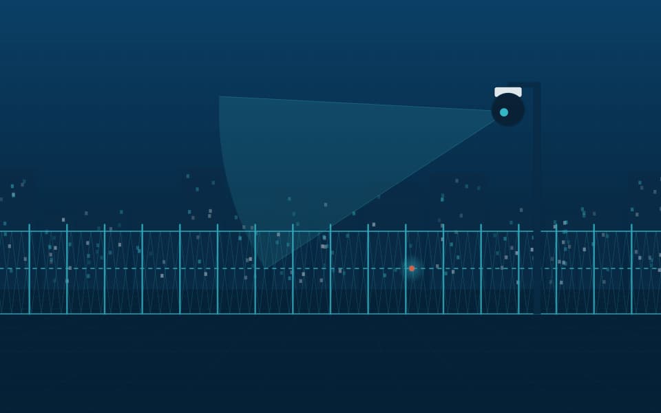 Perimeter fence with detection and a PTZ camera pole, at night
