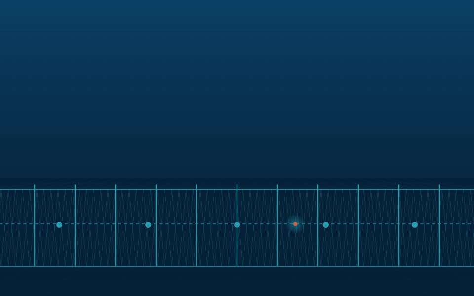 Fence line with fibre-optic sensing zones, at night