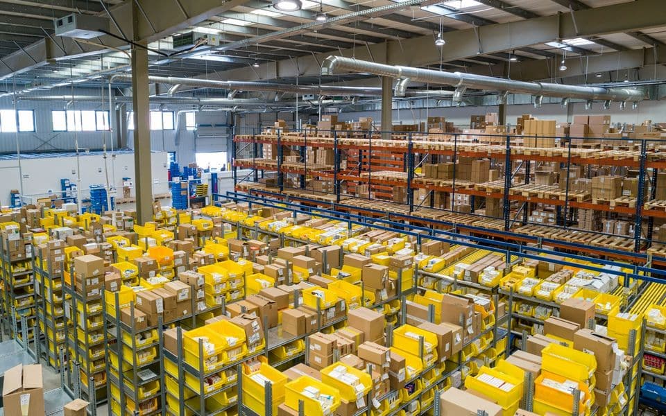 Modern logistics warehouse facility interior with polished concrete floor