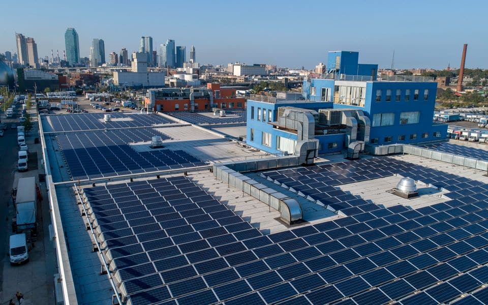 A rooftop solar PV array on a commercial building