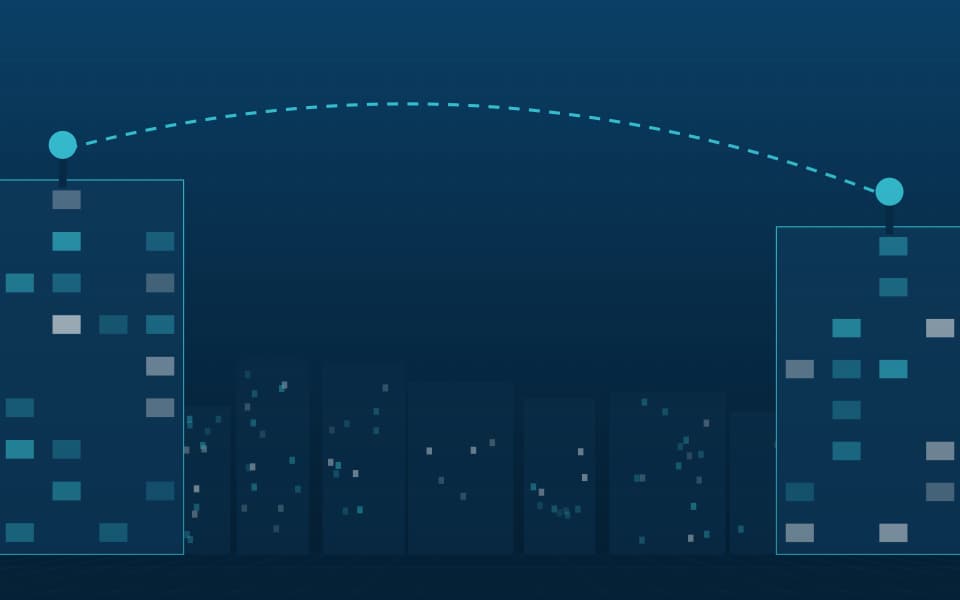 Point-to-point wireless link between two buildings (detail), at night